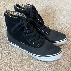 Black suede high top vans